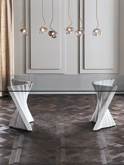 Tavolo Plisset con piano in vetro e basi in marmo Palissandro di Cattelan Italia